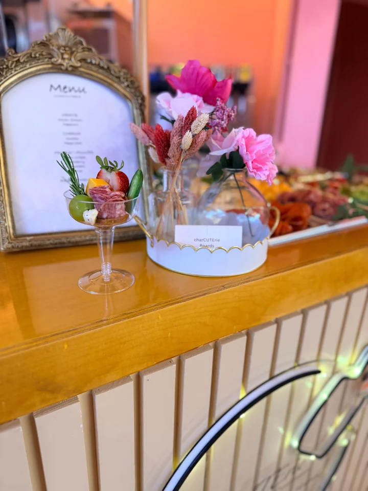 Elegant event place setting with an individual charcuterie cup